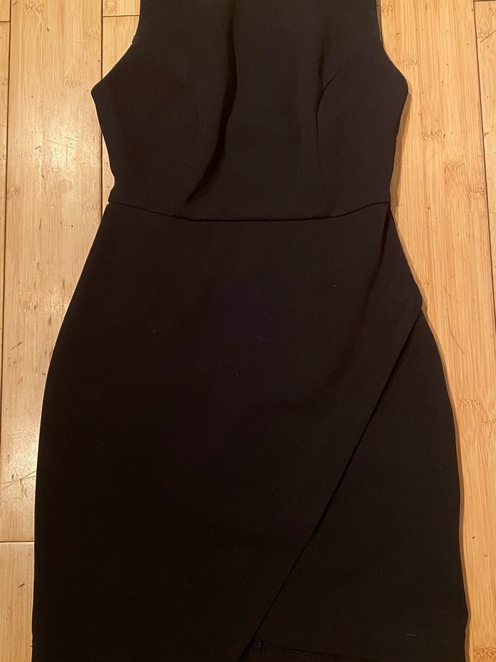 Aakaa Black Sleeveless Mini Dress with Asymmetrical Skirt